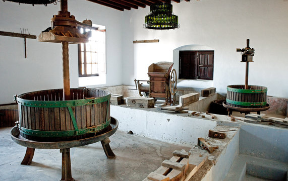 Old press for grape vine