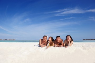 Fototapeta premium group of happy young people have fun on bach