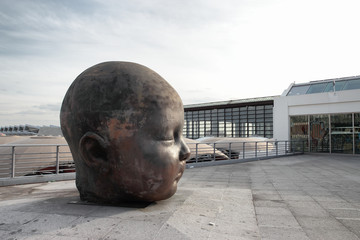 Naklejka premium baby face statue, Atocha station in Madrid