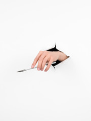 woman hand holding a medical knife