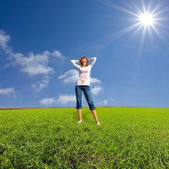 pretty girl among a green fields