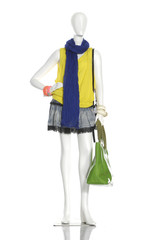 female clothing in jeans with bag, scarf on mannequin