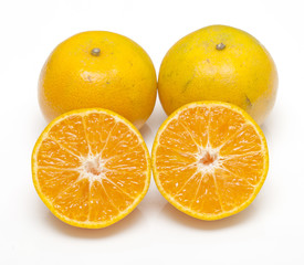 Orange juice and oranges isolated on white background