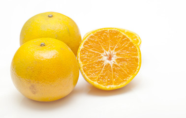 Naklejka na ściany i meble Orange juice and oranges isolated on white background