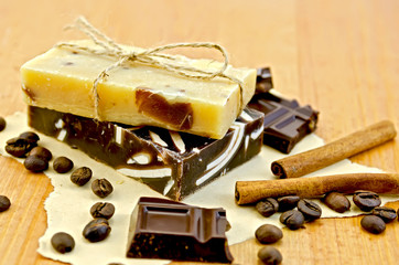 Soap homemade with chocolate on paper and board