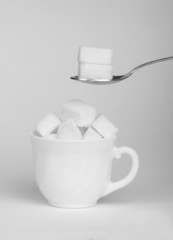 Sugar lumps in cup