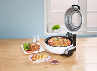 Pizza making machine in the kitchen