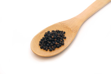 pepper in wooden spoon