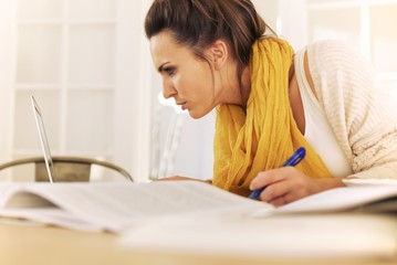 College Student Busy with Home Study