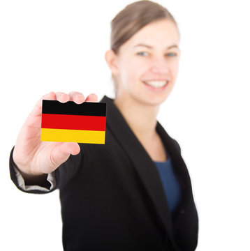 Business Woman Holding A Card With The German Flag