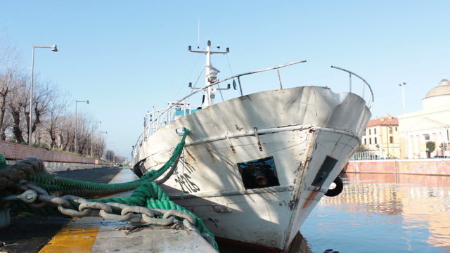 Docked boat in port