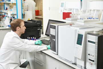 Scientist researcher man works in laboratory