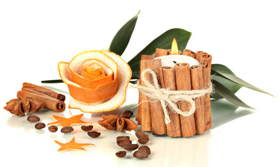 Decorative rose from dry orange peel and burning candle