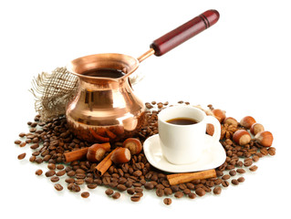 Cup and pot of coffee and coffee beans, isolated on white