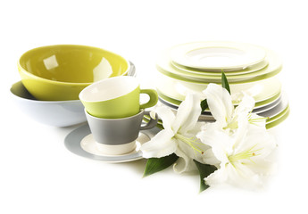 Empty bowls, plates and cups isolated on white