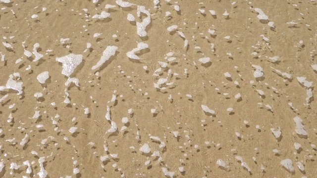 Sea - wave  destroys house that is painted in the sand