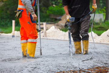 building site compacting concrete