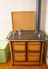 antique wood burning stove in a mountain home with mocha