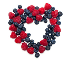 heart made of blueberries and raspberries