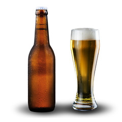 bottle and glass of beer on white background