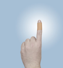 Naklejka premium Adhesive bandage plaster on the finger.