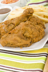 Fried Chicken & Chips - Fried floured chicken & fries. © paul_brighton