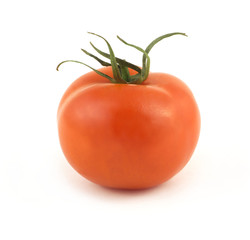 Ripe red tomato with green leaves isolated on white closeup