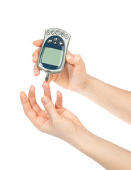 Diabetic patient measuring glucose level blood test