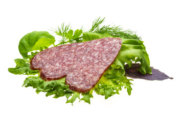 Sausages with salad and basil