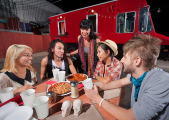 Hipsters with Plates of Pizza