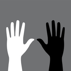 two colored hands on a gray background