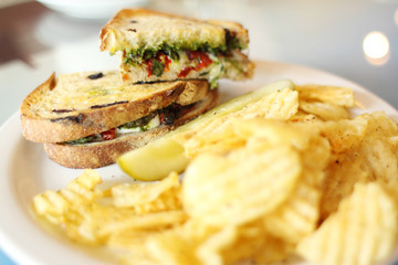 Panini sandwich with chips.