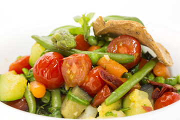 salad of steamed zucchini on a white dish at restaurant