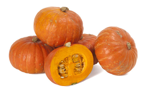 Pumpkins stacked on white. Clipping path included