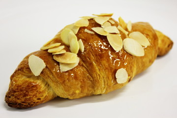 Almond croissants on a white background.