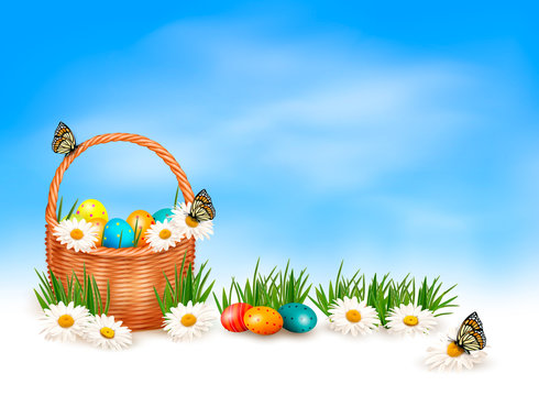 Easter background with Easter eggs in basket and butterfly on fl