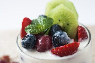 yogurt with grapes, kiwi and berries
