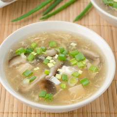Chinese spicy soup with egg, shiitake mushrooms, tofu