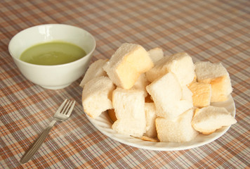 piece of bread with green egg custard