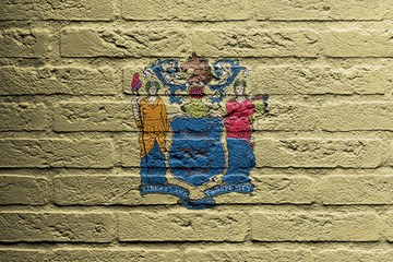 Brick wall with a painting of a flag, New Jersey