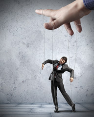 Business man marionette
