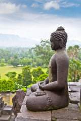 A statue of the Buddha from Borobudur on Java , Indonesia.