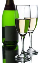 Fluted champagne glasses with champagne bottle