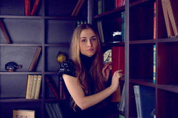 girl in the home library
