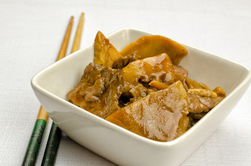 Chinese food, beef with bamboo and mushrooms