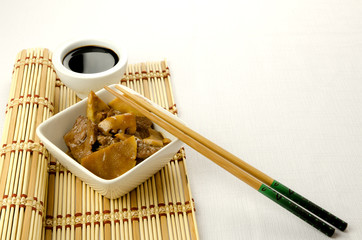 Chinese food, beef with bamboo and mushrooms