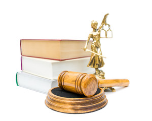 gavel, the statue of justice, and a stack of books isolated on w