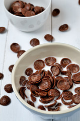 chocolate flakes in the bowl with milk