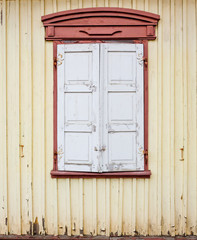 Obraz premium Old window with closed shutters