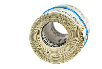 Roll of US dollar wrapped by rubber over white background